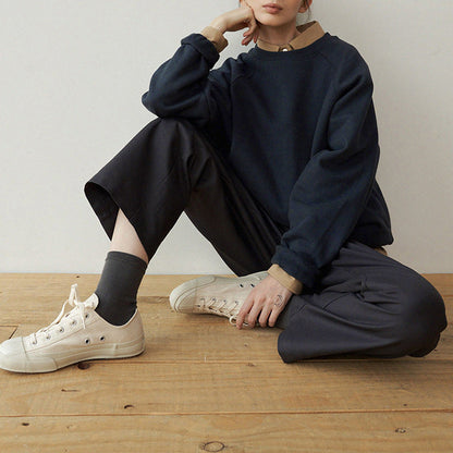 A Vintage Style Sweater with Delicate Timeless Details