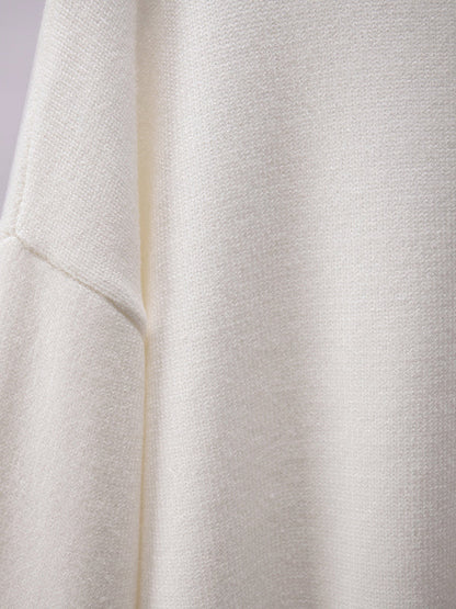 A Vintage Style Sweater with Delicate Timeless Details